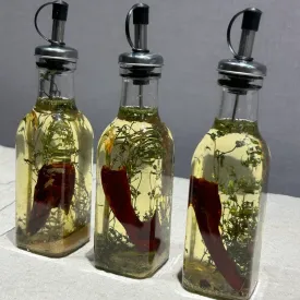 Масло острое с травами, 200мл.